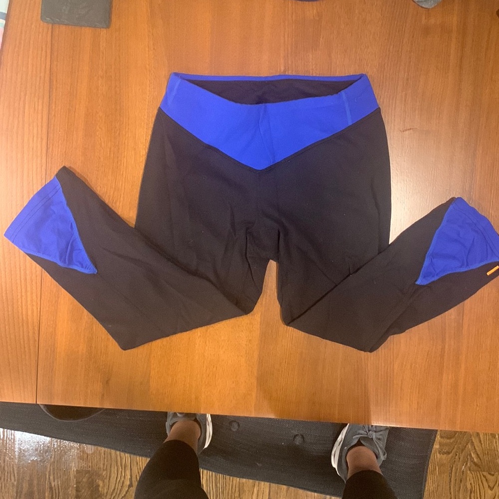 Black Lucy leggings with royal blue detail — Size S